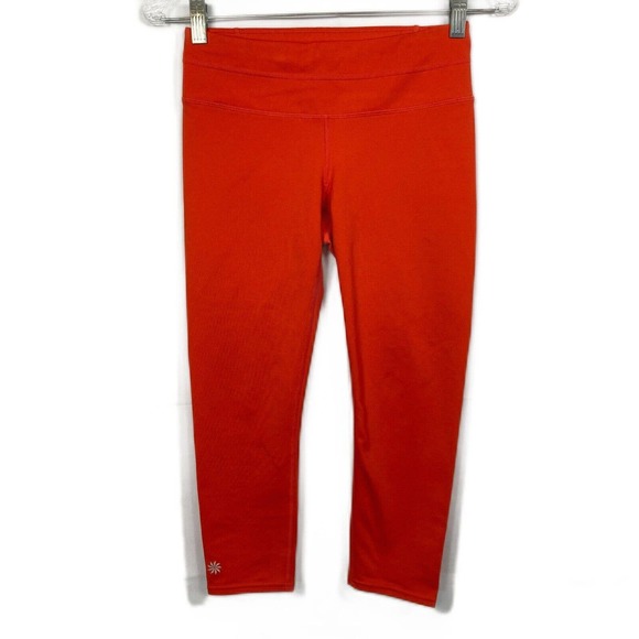 Athleta Pants - Athleta Leggings Womens Sz XS Orange Chaturanga Capri Crop Pocket Logo